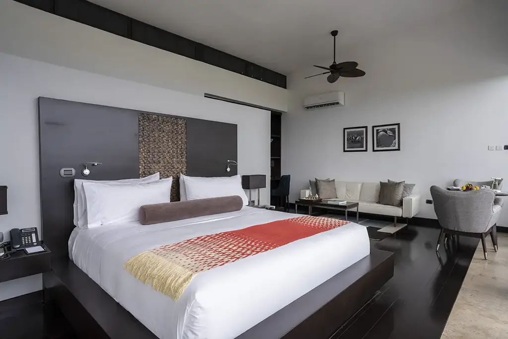 Garden Suite bed and seating area
